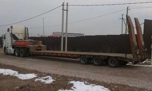 Трал ровный с аппарелями 3 оси 38 тонн 12 м.